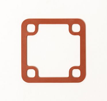 Das Bild zeigt eine rotbraune, quadratische Rahmendichtung mit abgerundeten Ecken und vier Ausschnitten in den Ecken, die auf einem weißen Hintergrund liegt.